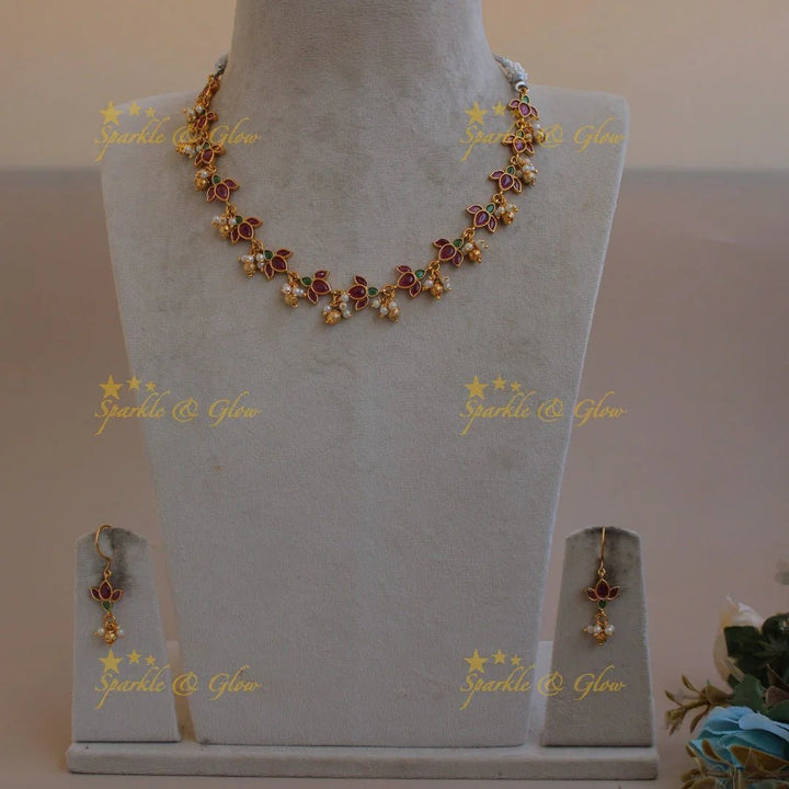 Elegant Lotus short necklace with ruby emerald pearls and gold beads - Sparkle and Glow