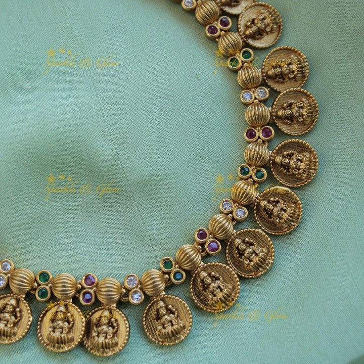 Gold alike Lakshmi coin short necklace with ruby emerald and white stones - Sparkle and Glow