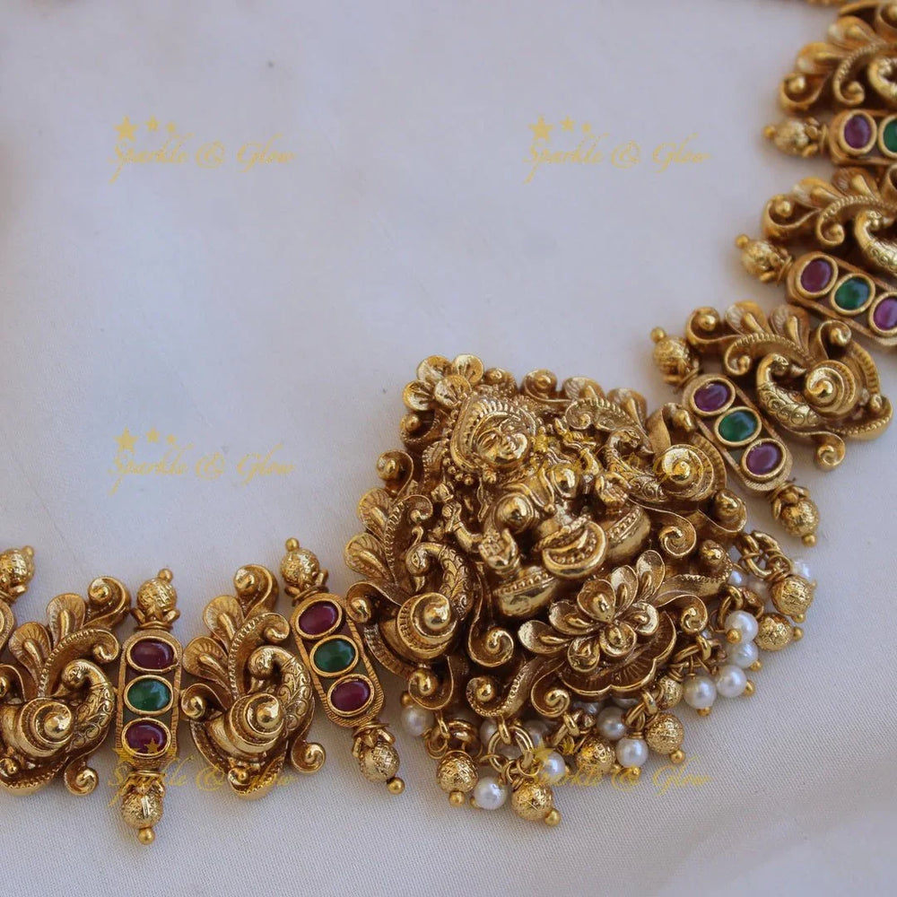 Elegant Lakshmi peacock carved choker with ruby emerald and gold beads - Sparkle and Glow