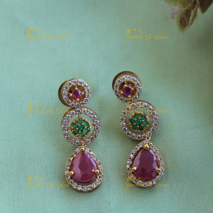 Statement Floral and spiral design AD short necklace with ruby and emerald stones - Sparkle and Glow