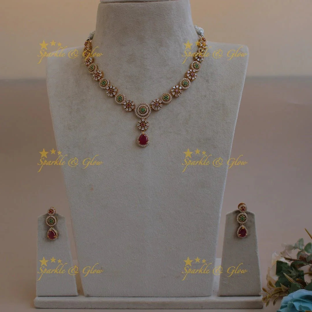 Statement Floral and spiral design AD short necklace with ruby and emerald stones - Sparkle and Glow
