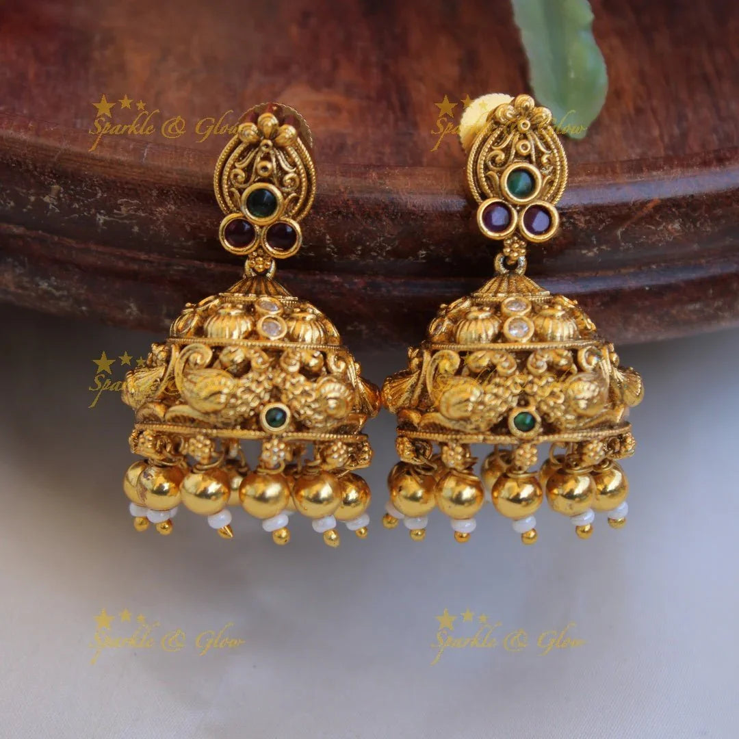 Gorgeous Lakshmi peacock carved gold alike choker with multi colour stones and gold beads - Sparkle and Glow