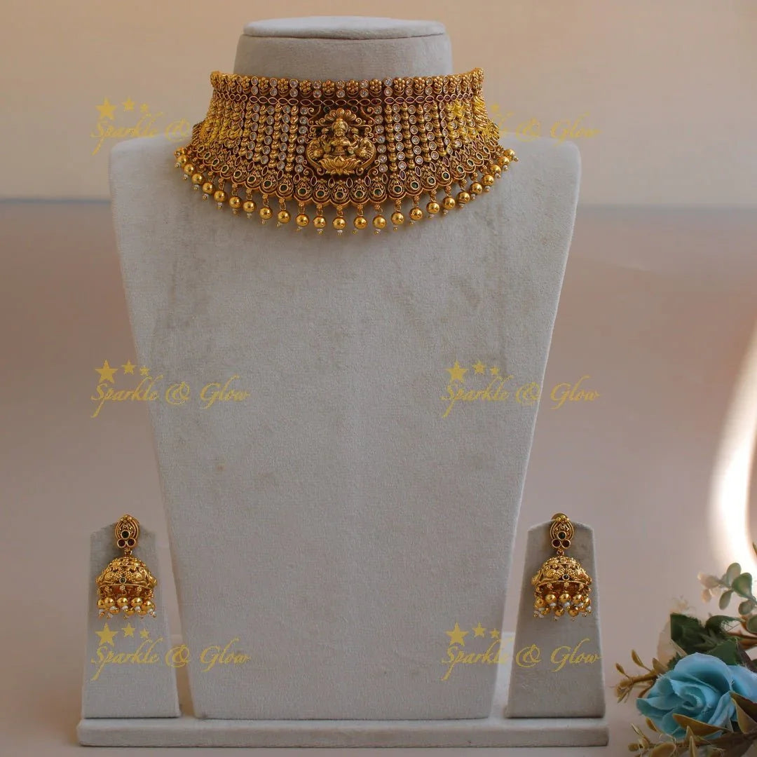 Gorgeous Lakshmi peacock carved gold alike choker with multi colour stones and gold beads - Sparkle and Glow