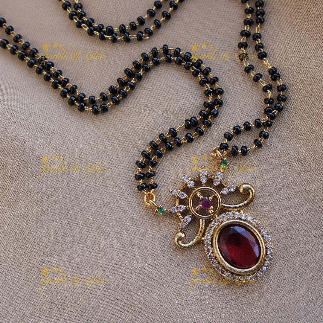 Statement floral design oval stone pendant two layer black beads necklace , mangalsutra - maroon