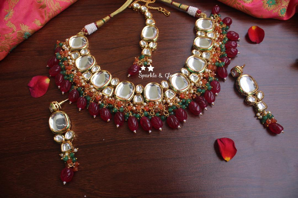 Grand Kundan stone necklace with ruby red bead drops - Sparkle and Glow