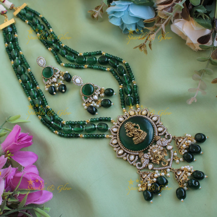 Lakshmi Ganeha carved stone pendant Victorian AD haram with multi layer beads chain and jhumuka drops - sea blue