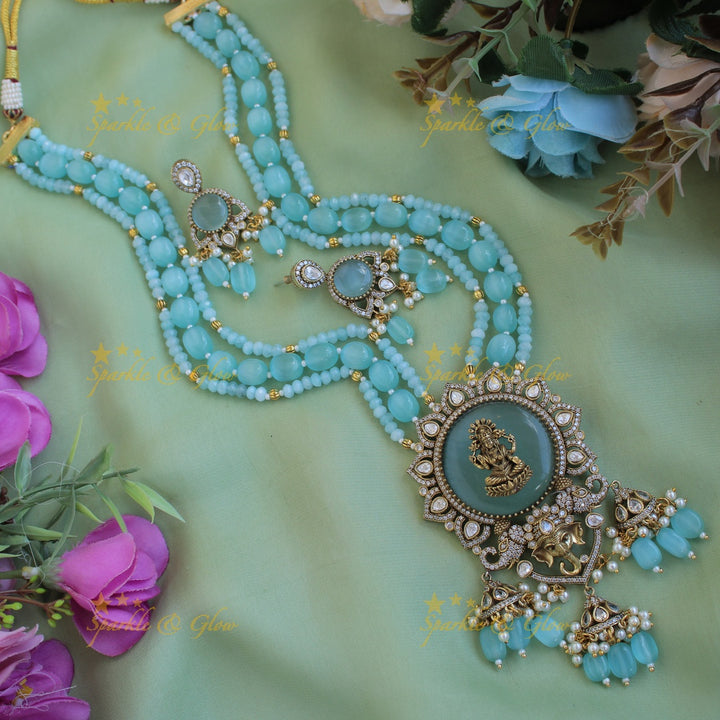 Lakshmi Ganeha carved stone pendant Victorian AD haram with multi layer beads chain and jhumuka drops - sea blue