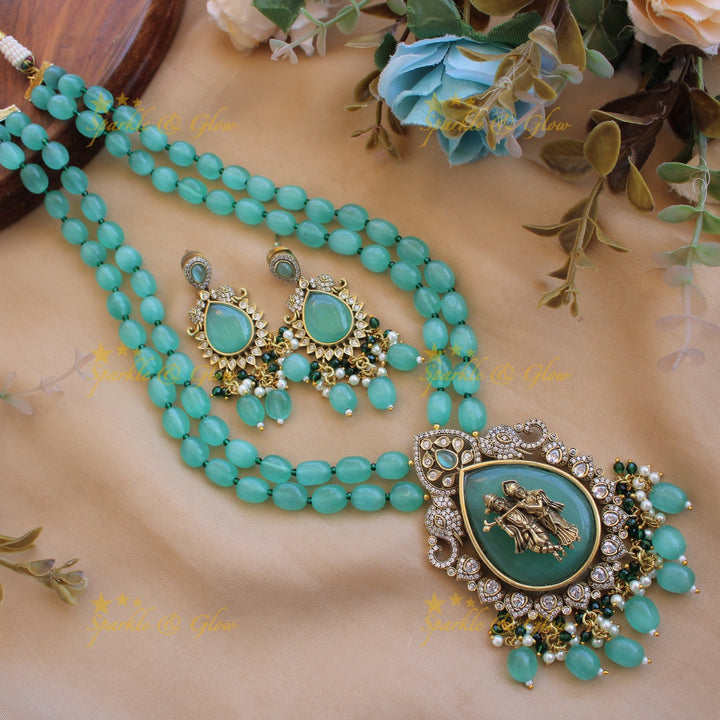 Elegant Radha krishna carved pendant Victorian AD haram with two layer sea blue beads chain