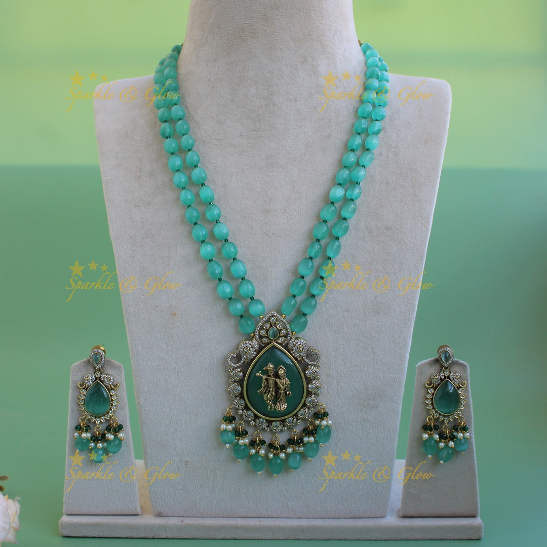 Elegant Radha krishna carved pendant Victorian AD haram with two layer sea blue beads chain