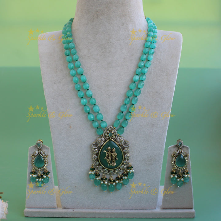 Elegant Radha krishna carved pendant Victorian AD haram with two layer sea blue beads chain