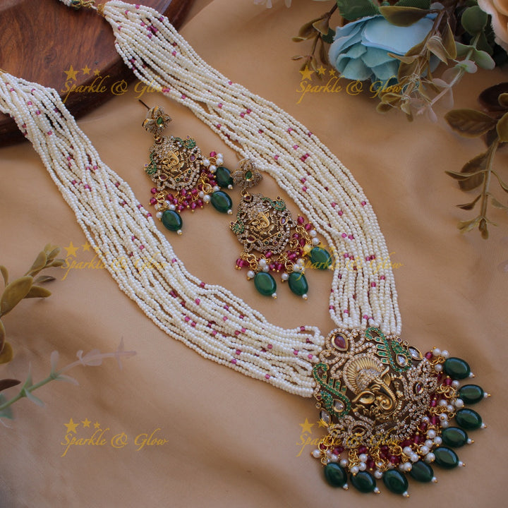 Ganesha peacock carved pendant Victorian AD haram with multi layer pearl red beads chain with green beads