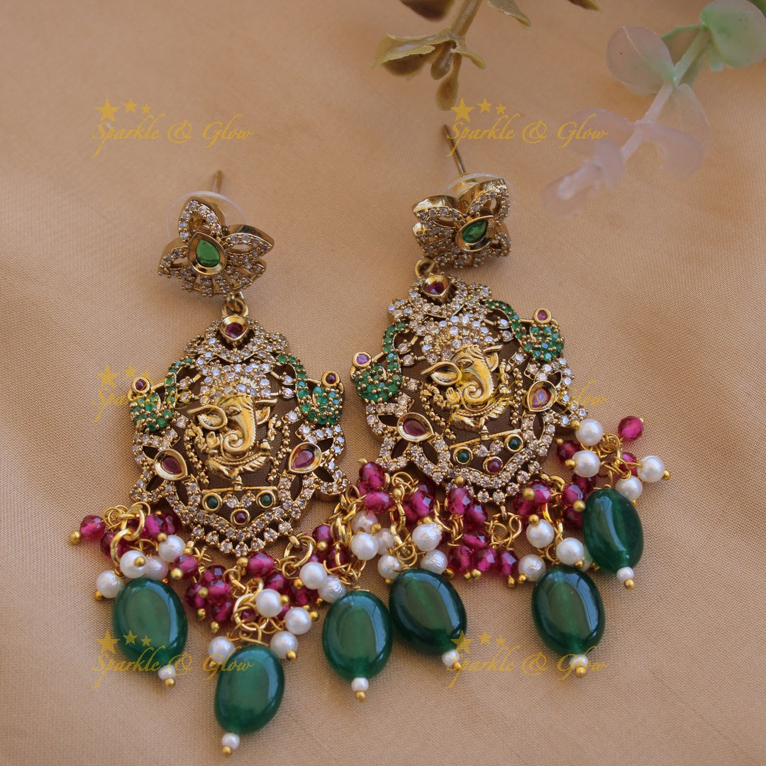 Ganesha peacock carved pendant Victorian AD haram with multi layer pearl red beads chain with green beads