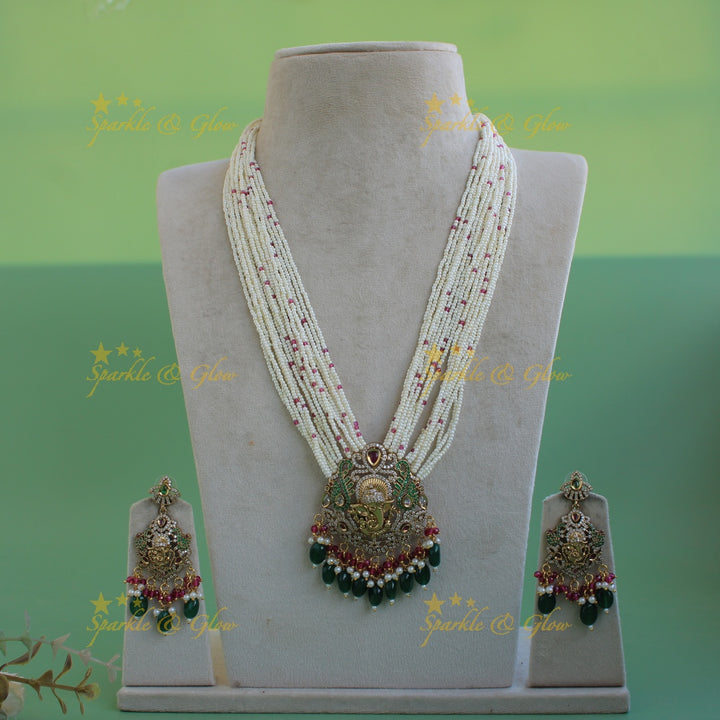 Ganesha peacock carved pendant Victorian AD haram with multi layer pearl red beads chain with green beads