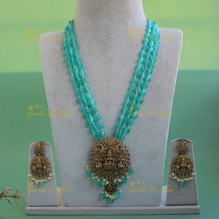 Beautiful Lakshmi peacock carved pendant Victorian AD haram with multi layer sea blue beads chain