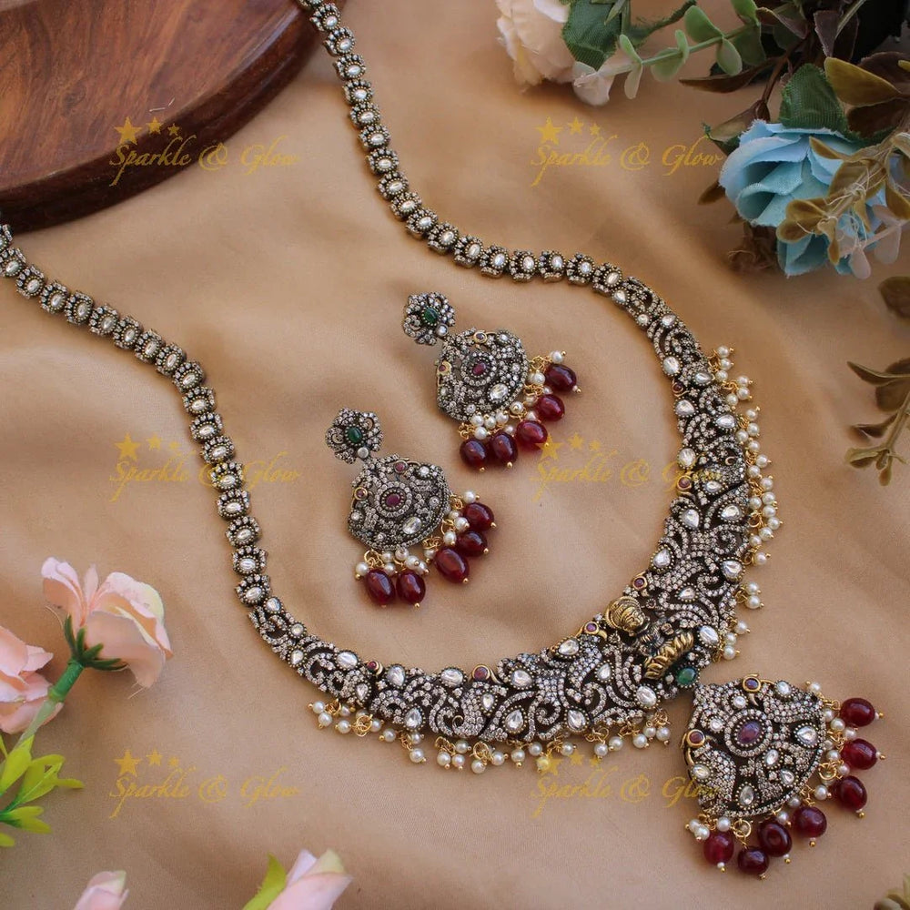 Gorgeous Lakshmi peacock design Victorian AD long necklace with pearls and purple beads - Sparkle and Glow