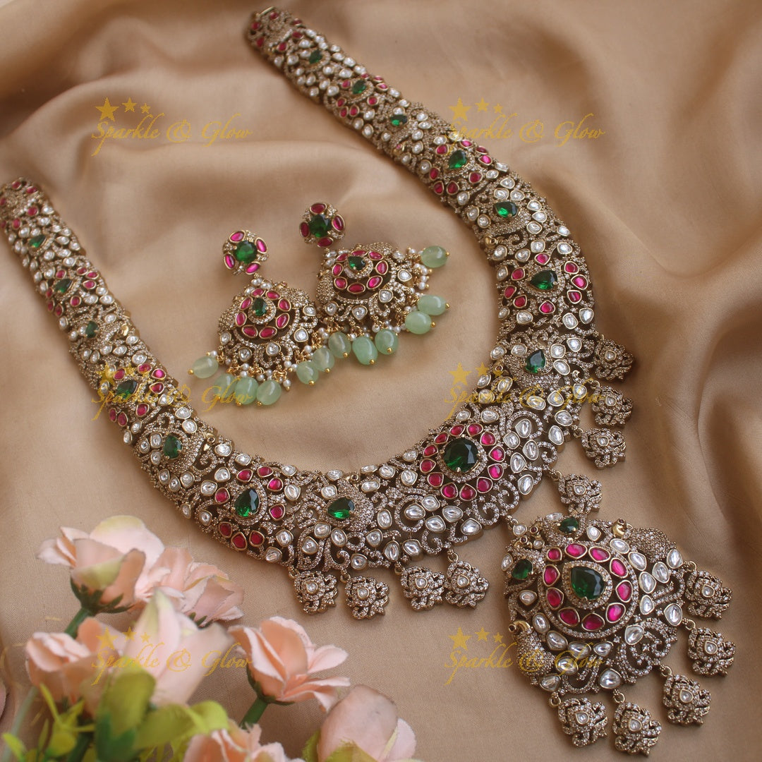 Grand intricate Peacock floral design Victorian AD long necklace with ruby emerald and mint green beads