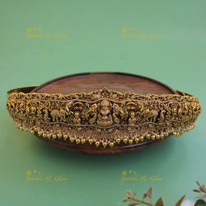 Grand intricate Lakshmi elephant peacock carved hipbelt with stones and green beads - Sparkle and Glow