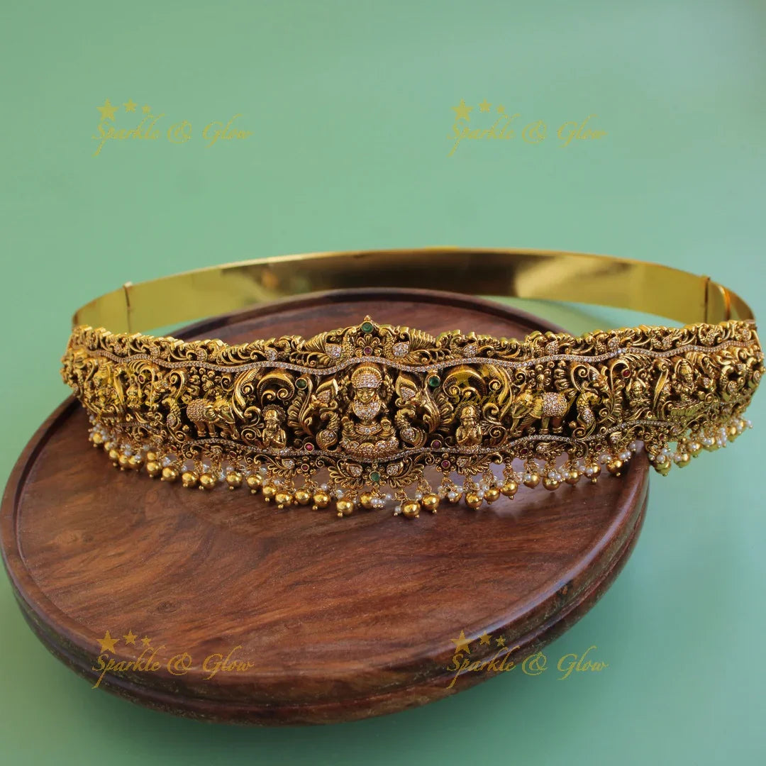 Grand intricate Lakshmi elephant peacock carved hipbelt with stones and green beads - Sparkle and Glow