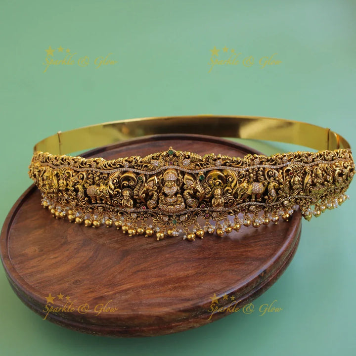 Grand intricate Lakshmi elephant peacock carved hipbelt with stones and green beads - Sparkle and Glow