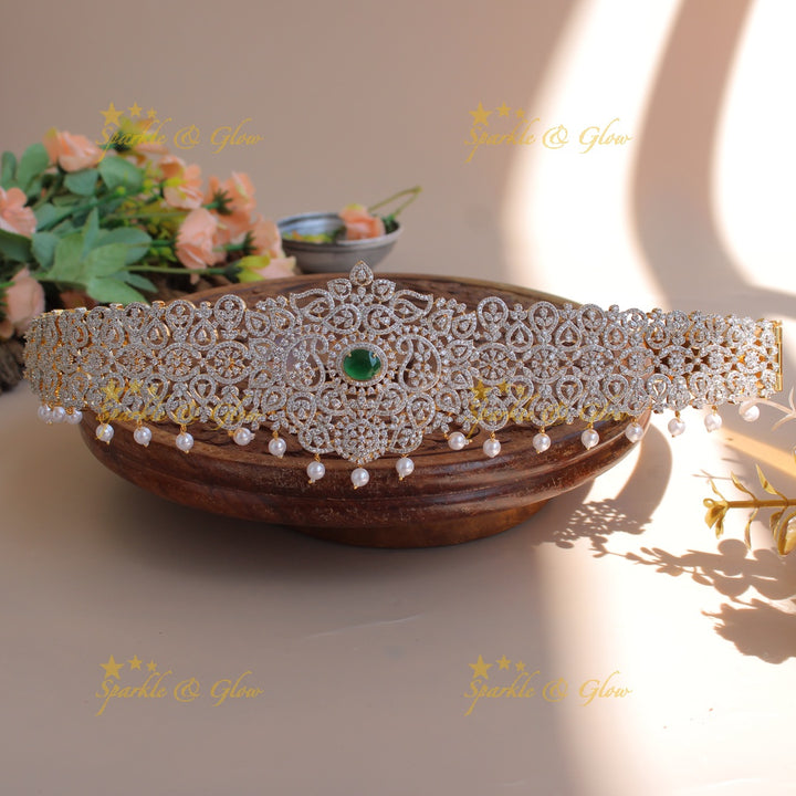 Sparkling Floral leaf design american diamond hipbelt with emerald and pearl drops