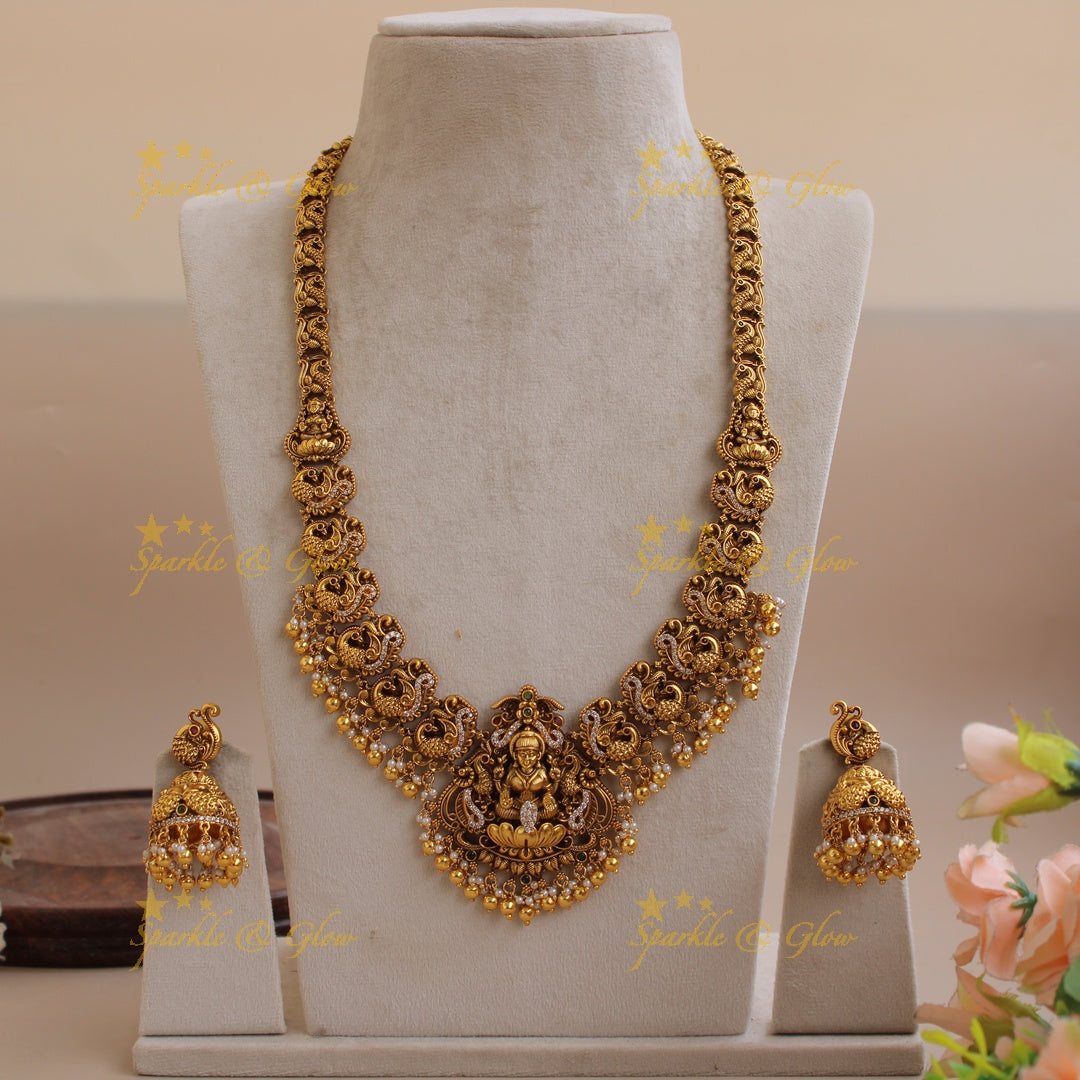 Gorgeous Lakshmi peacock carved long necklace with CZ stones pearls and gold beads