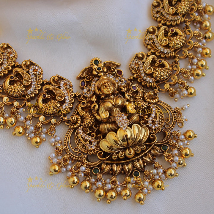 Gold alike Lakshmi peacock carved short necklace with CZ stones pearls and gold beads
