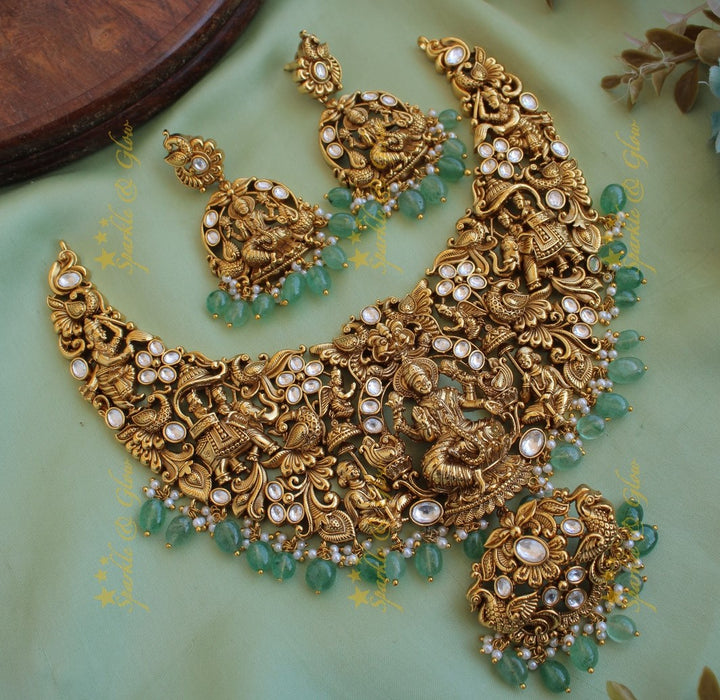 Exclusive Lakshmi elephant peacock carved jadau short necklace with mint green beads