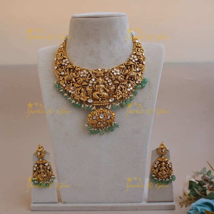 Exclusive Lakshmi elephant peacock carved jadau short necklace with mint green beads