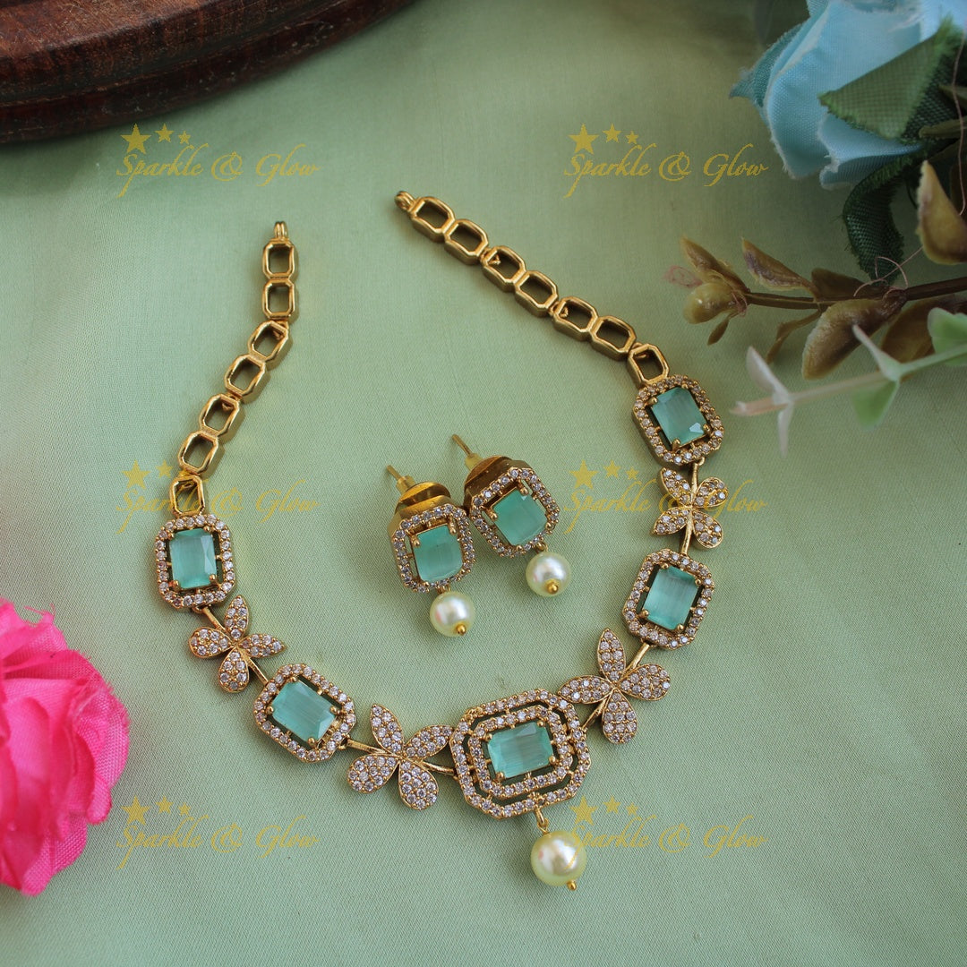 Statement butterfly design AD short necklace with mint green stones and pearl drop