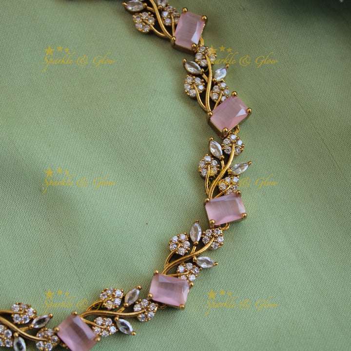 Elegant floral and leaf design AD short necklace with baby pink stones