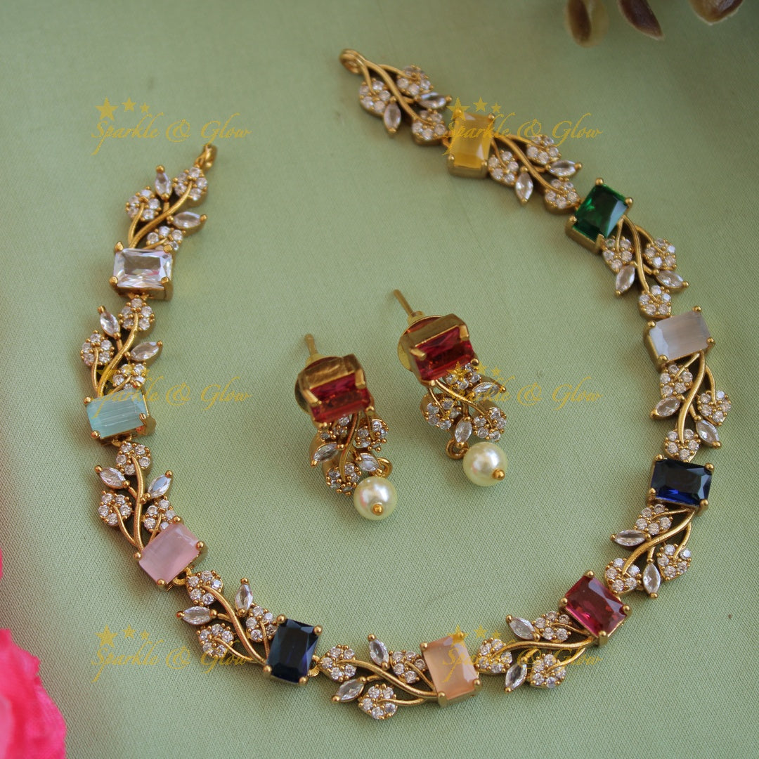 Elegant floral and leaf design AD short necklace with ruby and emerald stones