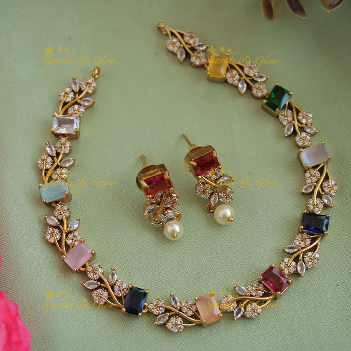 Elegant floral and leaf design AD short necklace with ruby and emerald stones