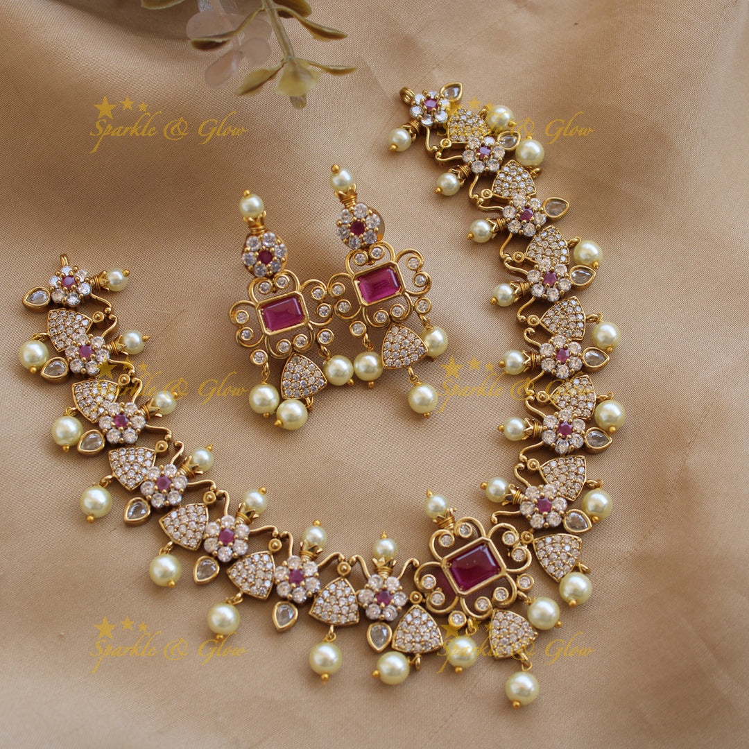 Beautiful floral and triangle design AD short necklace with ruby stones - pink