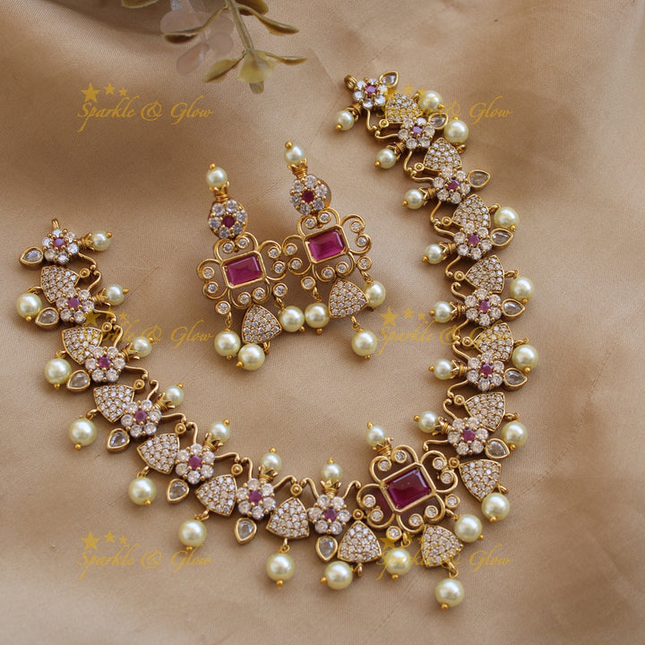 Beautiful floral and triangle design AD short necklace with ruby stones - pink
