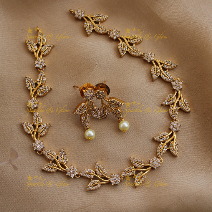 Stunning floral and leaflet design AD short necklace with stones - white