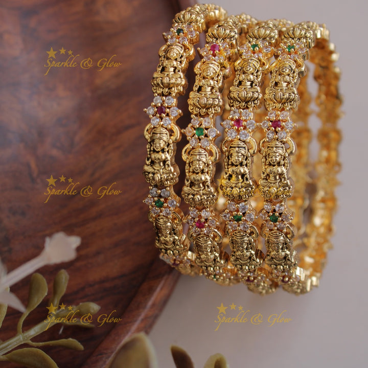 Elegant Lakshmi carved floral bangles with multi colour stones two pairs,  2.6