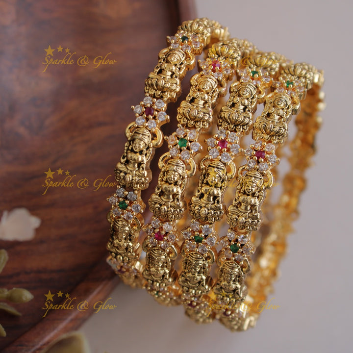 Elegant Lakshmi carved floral bangles with multi colour stones two pairs,  2.6