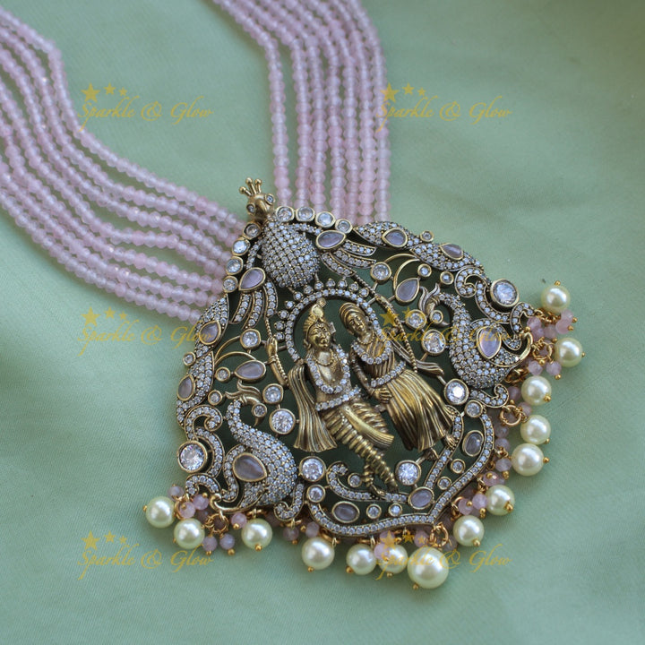 Stunning Radha krishna pendant Victorian AD haram with multi layer baby pink beads chain