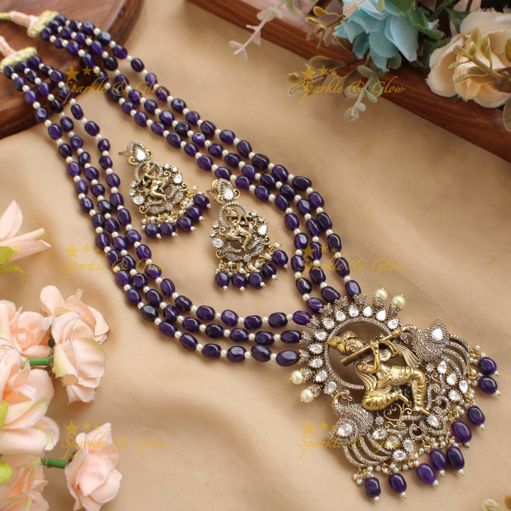 Statement Krishna playing flute peacock design pendant Victorian AD haram with multi layer beads chain - blue