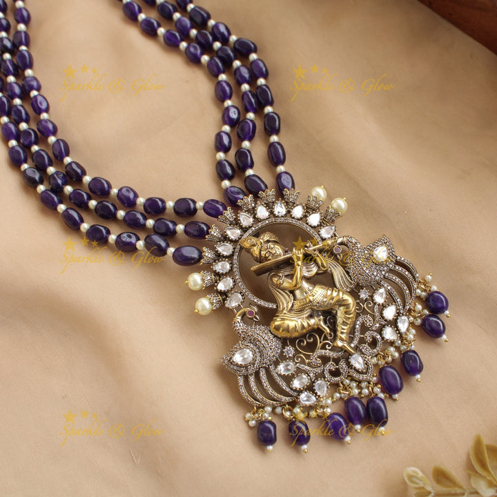 Statement Krishna playing flute peacock design pendant Victorian AD haram with multi layer beads chain - blue
