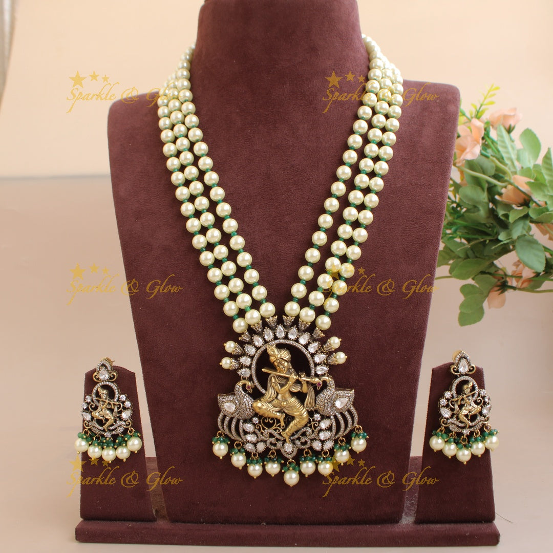 Statement Krishna playing flute peacock design pendant Victorian AD haram with multi layer pearl chain - pearl green