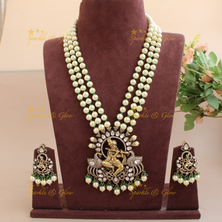Statement Krishna playing flute peacock design pendant Victorian AD haram with multi layer pearl chain - pearl green