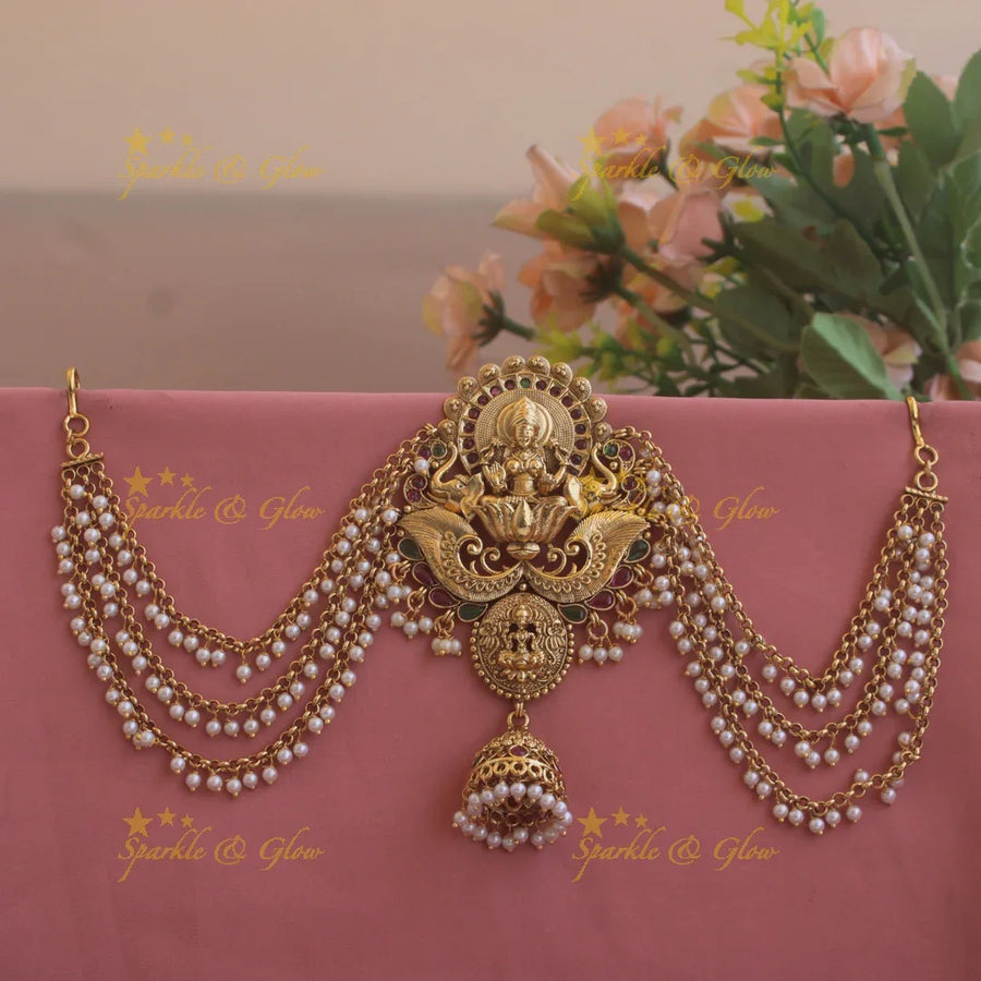 Beautiful Lakshmi on lotus and elephant carved Jada billa with maatil with jhumuka drop - Sparkle and Glow