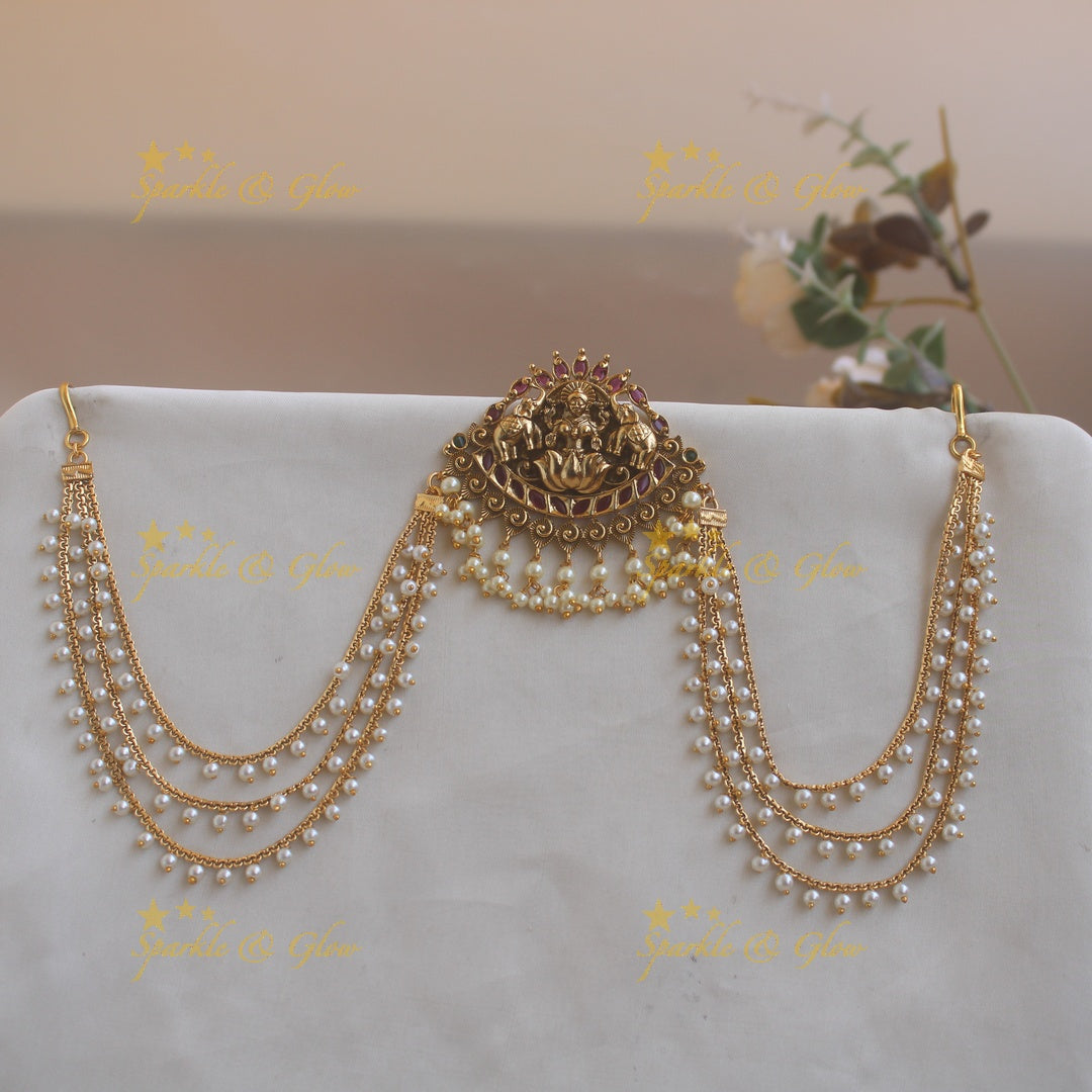 Stunning Lakshmi and leaves carved Jada billa with pearl maatil with kemp stones