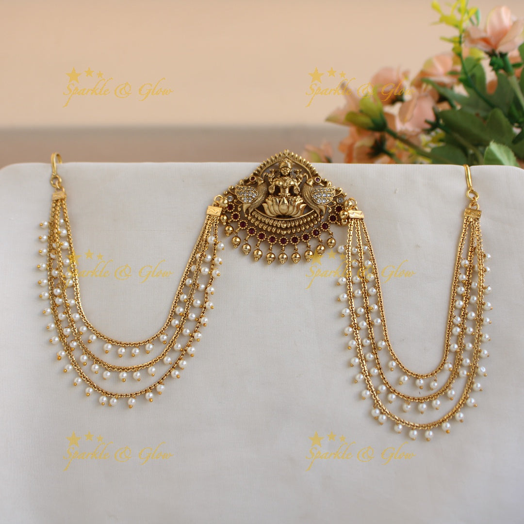 Stunning Lakshmi and peacock carved Jada billa with pearl maatil with kemp stones