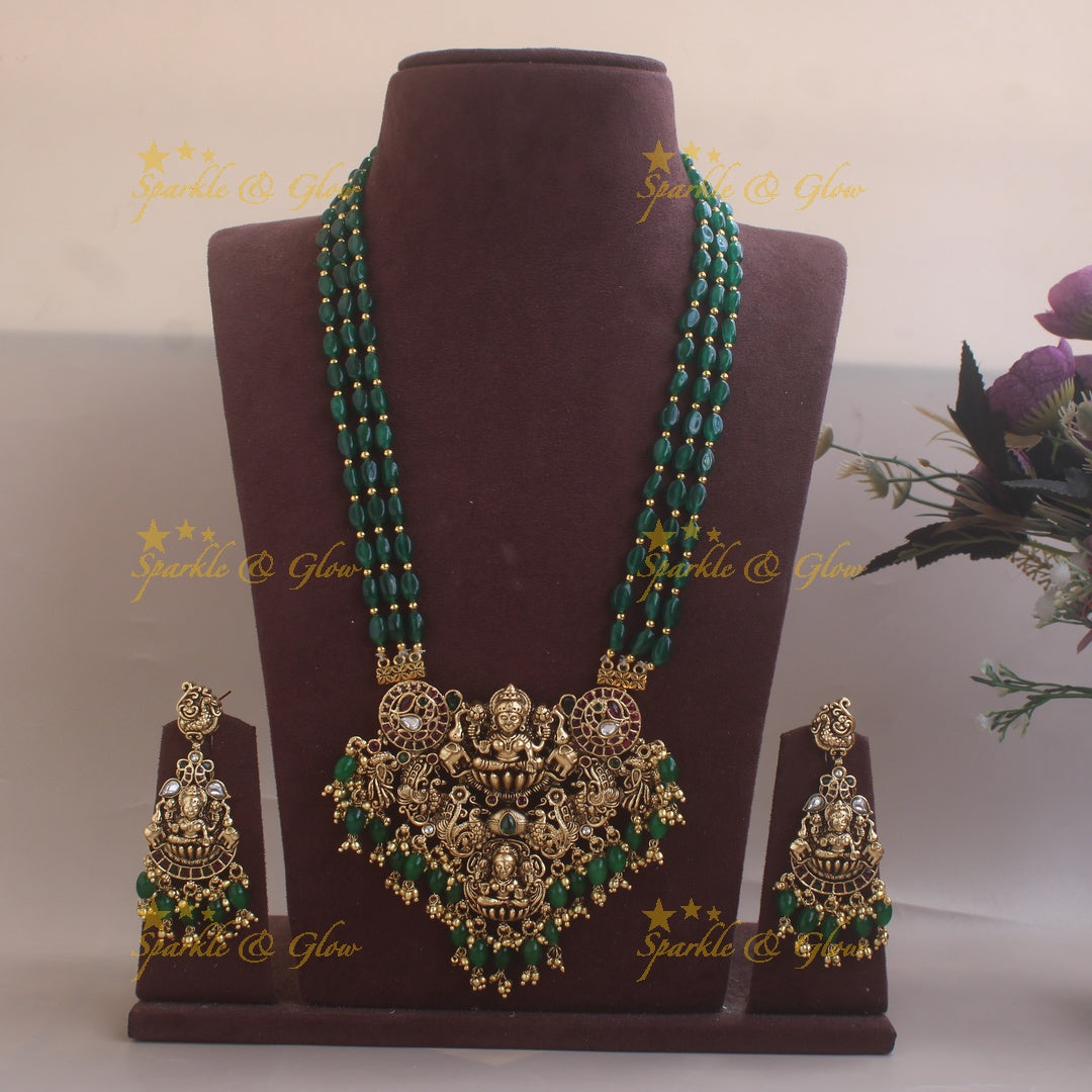 Beautiful Lakshmi peacock carved pendant long necklace with multi layer green beads chain