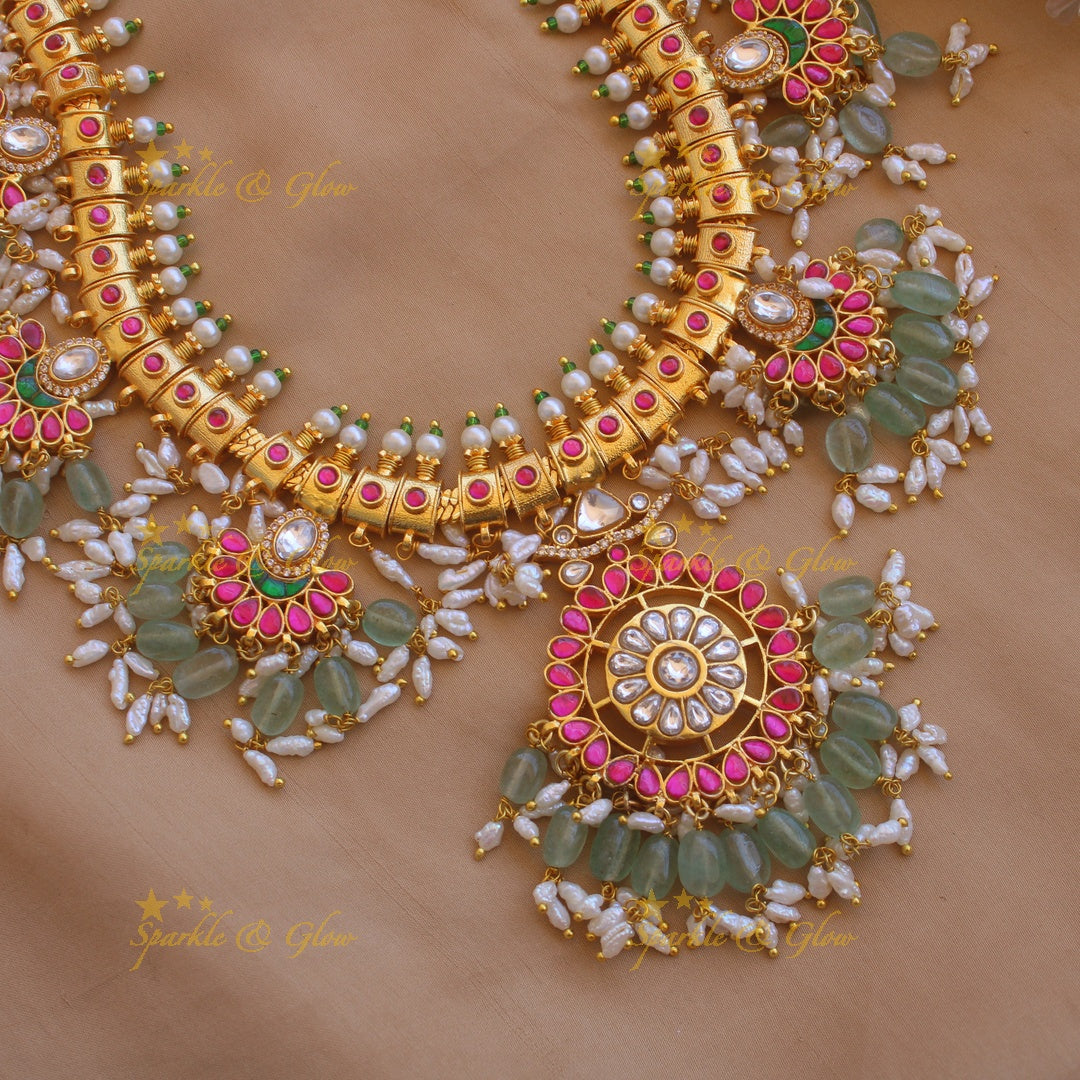 Gorgeous floral and moon design jadau long necklace with mint green beads and rice pearls