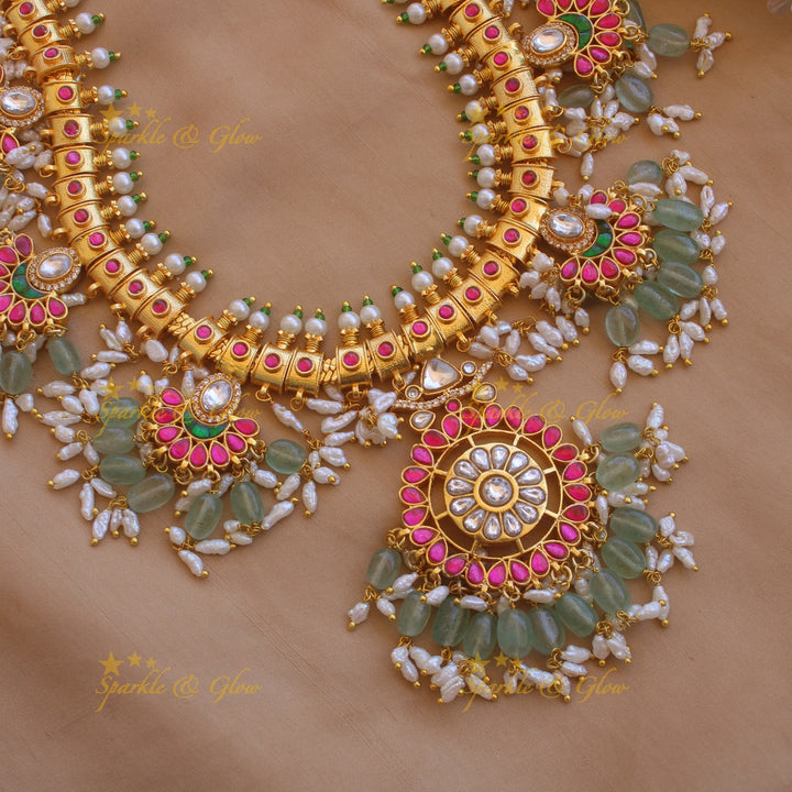 Gorgeous floral and moon design jadau long necklace with mint green beads and rice pearls