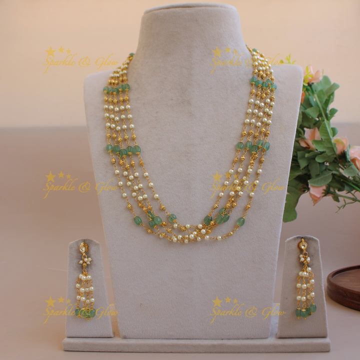 Stunning Five layer pearl haram with green and gold beads