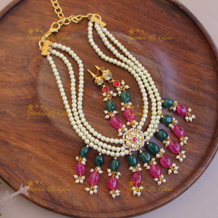 Beautiful three layer kundan short necklace with pink and green bead drops